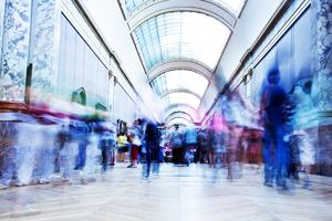 blurred people walking blurred people walking